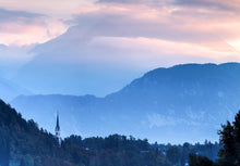 Load image into Gallery viewer, Lake Bled Mountain Photography | Church of St Martina, Alpine wall art - Home Decor Gifts - Sebastien Coell Photography