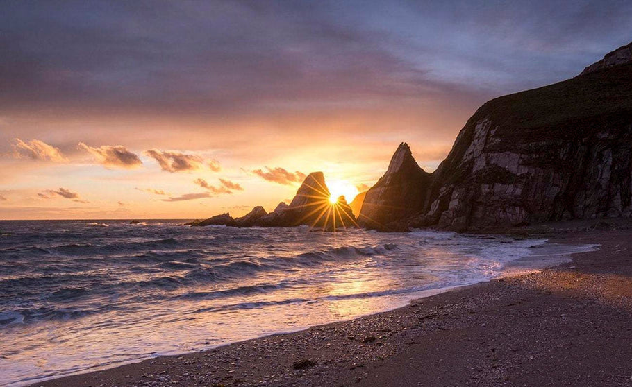 A Photographer’s Guide to Capturing Westcombe Bay: Starbursts, Sunsets, and Coastal Beauty